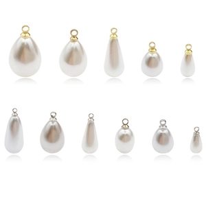 Teardrop and oval faux pearl charms with gold and silver loops for DIY jewelry making