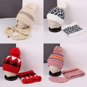 Winter plush set with warm faux fur pom pom knit hat and matching scarf for women