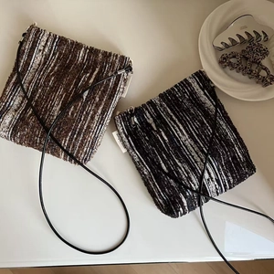 Retro striped knit crossbody phone bags in brown and black with leather straps