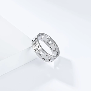 Detail of silver stainless steel H-link ring featuring three inlaid crystal diamonds