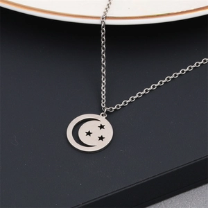 Polished silver stainless steel necklace with round moon and stars pendant design