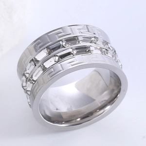 Silver stainless steel ring featuring Greek key patterns and double rows of cubic zirconia