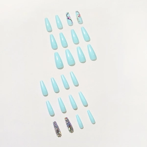 Long coffin fake nails in tiffany blue with sparkling rhinestones set on white backdrop