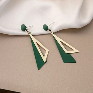 Minimalist geometric dark green and gold triangle drop earrings on silk background