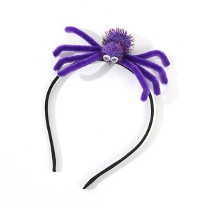 Detailed view of the Halloween headband featuring a purple plush spider on a black frame
