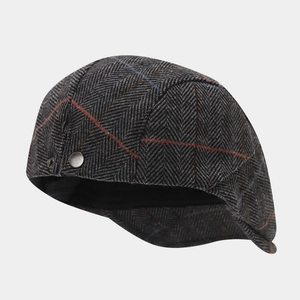 Classic herringbone flat cap with orange and blue plaid pattern and side metal buckle