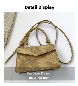 Détails du sac à bandoulière en denim jaune-brun avec poignée nouée et boucles dorées