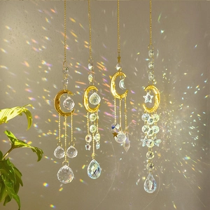 Detail showing sunlight refraction through crystal suncatchers creating rainbows