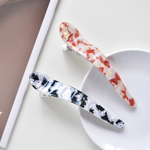 Set of two marble pattern acetate hair claws in red-white and black-white marble finish