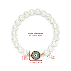Detailed view of the evil eye pearl bracelet with exact measurements and sizing info