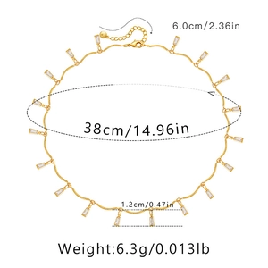 Detail view of 18K gold wave chain necklace with zircon pendants and dimension specifications