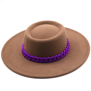 Brown wool felt jazz fedora with a stylish wide purple chain band on a white background