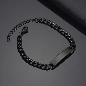 Detailed close-up of matte black stainless steel curb chain with adjustable lobster clasp