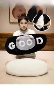 Detail of creative plush cat pillow showing the hidden zipper and removable inner lining
