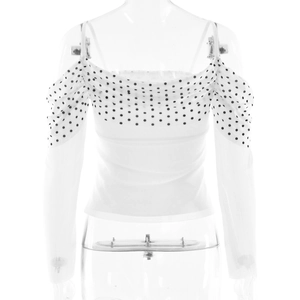 Detail of white slim fit top with transparent polka dot mesh long sleeves on mannequin