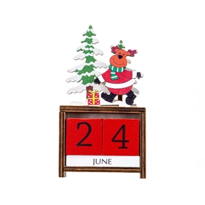 Detailopname van houten kerstkalender met rendier en datumblokken voor aftellen