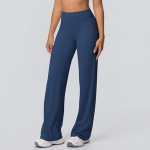 Detailed view of high-waisted navy blue yoga pants with wide-leg cut and elastic waistband