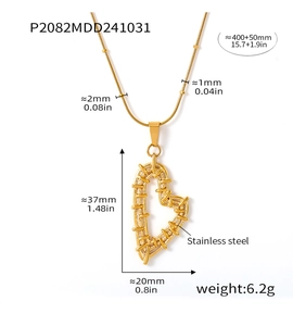 Detailed view of golden heart pendant with braided texture and precise dimensions