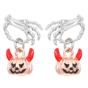 Minimalist silver skull hand earrings with rose gold devil horn pumpkin charms