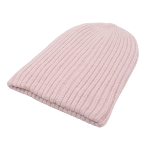 Close-up of light pink rib-knit beanie showing soft texture and fine winter stitching