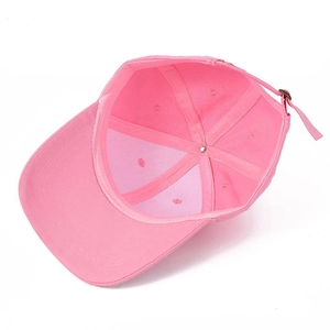 Detailed interior of the pink denim baseball cap showing adjustable strap and stitching