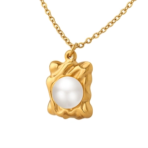 Elegant French style gold pendant necklace featuring a square charm with a large round pearl