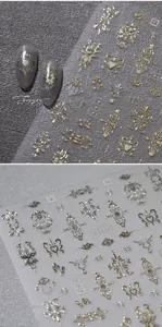 Macro detail of gold embossed nail stickers with European vintage heart and floral patterns