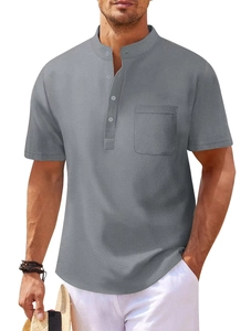 Detail shot of grey waffle knit fabric texture and chest pocket on men's polo shirt