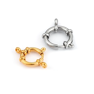 Detail of round spring ring clasps for DIY jewelry in gold and silver metal finishes