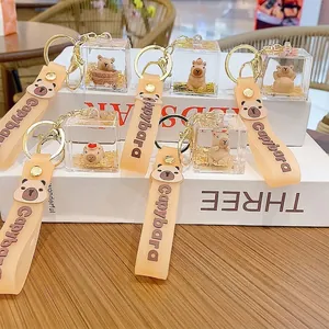 Cute Capybara drifting bottle keychain with liquid sand and silicone wristband