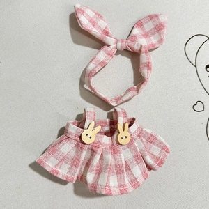 Pink checkered plush doll outfit featuring a rabbit ear headband and overall skirt with buttons