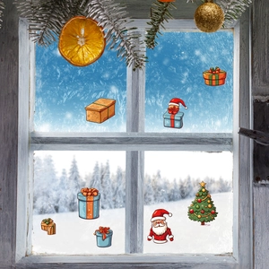 Christmas window stickers with Santa and tree on frosted glass against snowy pine forest