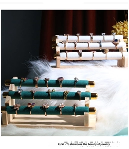 Detailed view of 3-tier velvet jewelry display stands with wooden base for rings