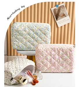 Quilted cotton floral makeup bags showing large capacity for brushes and skincare
