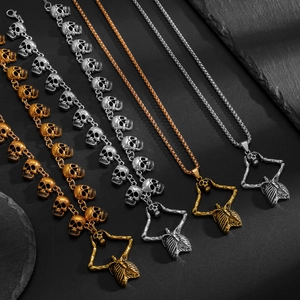 Gothische schedel ketting met skelet hanger in zilver en goud punk afwerking