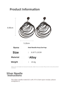 Detail view of large black multi-layer hoop earrings with 8.00cm by 5.10cm size specs
