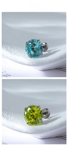 Detail of four-prong set nest-cut cubic zirconia stud earrings with screw-back in titanium steel