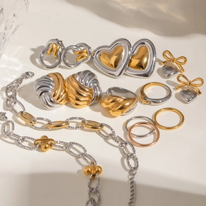 Mixed metal jewelry set with gold and silver earrings rings and chunky link chain