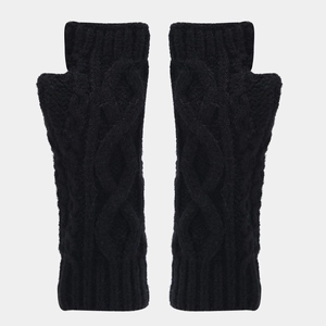 Detail of black cable knit fingerless gloves showing high-quality fabric texture