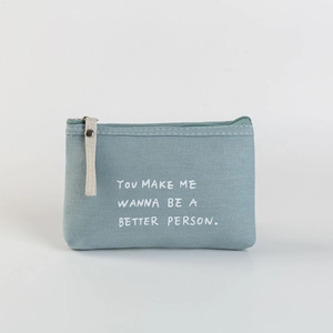 Blue floral canvas organizer bag with inspirational text on a soft grey background