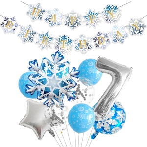 Close-up of winter snowflake party set with blue balloons and number 7 foil balloon