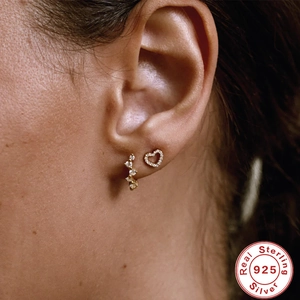 S925 sterling silver gold earrings with heart and streamline zircon studs on ear
