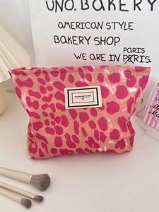 Stylish leopard print canvas makeup bag with pink leopard patterns and white woven label
