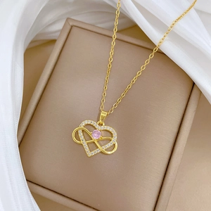 Titanium gold heart and infinity necklace with pink crystal and white zircon pavé