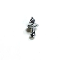 Detailed close-up of a silver mushroom-shaped metal pendant with a polished shiny finish