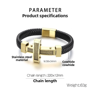 Detail of black woven leather bracelet with steel cable cross charm and gold magnetic clasp