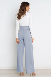 Rear view of high waisted wide leg trousers in light blue with elegant bow tie detail