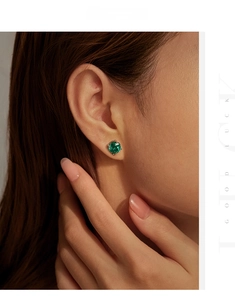 Close-up of 8mm Paraiba blue rose-cut cubic zirconia stud earrings in S925 sterling silver