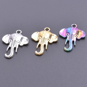 Three metallic elephant head pendants in silver, gold, and rainbow finishes for DIY jewelry