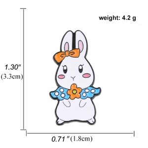 Cute white rabbit enamel pin badge with bow and flower details, size 1.30 x 0.71 inch